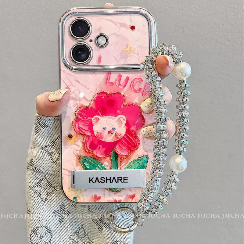 油絵の花とクマ デザイン 高級感あふれるブレスレット兼スタンド付き スマホケース、iPhone に対応