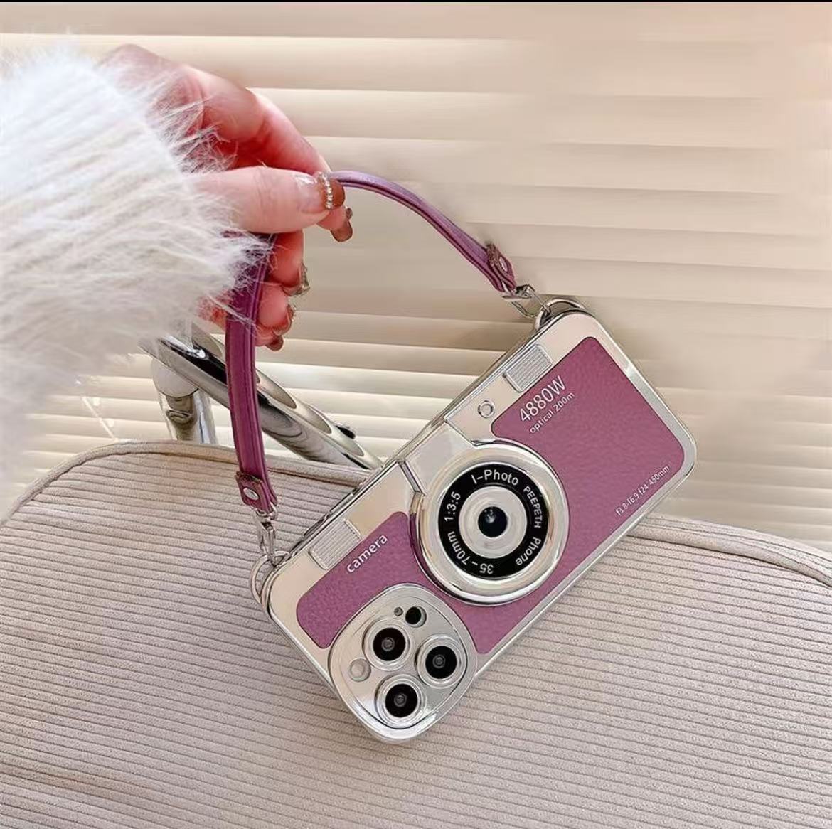 スマホケース カメラテーマのスマホケースで、ストラップ付き 耐衝撃・防振性能に優れ、高級感あふれるスマホケースで、iPhone に対応
