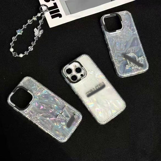 スマホケース  高級感貝殻グリッター  ダブルV&miu&Di**  耐衝撃・防振性能に優れ、高級感あふれるスマホケースで、iPhone13~16 に対応