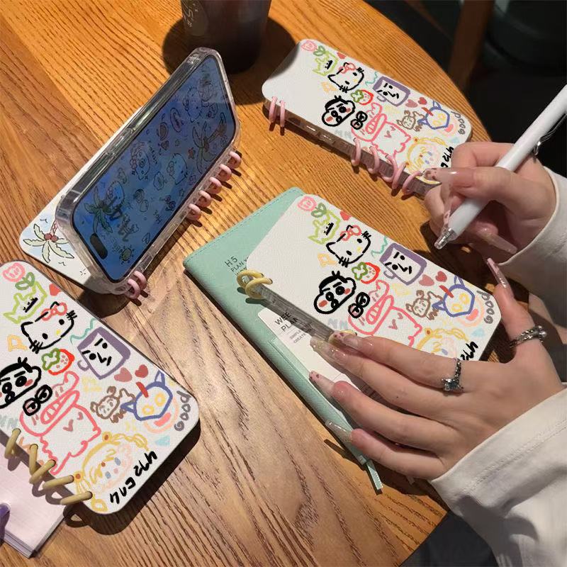 本型スマホケース 「カートゥーングラフィティ」テーマ 手帳型スマホケース  キャラクターの柔らかい 折りたたみ式 ノート型 スマホケース  iPhone に対応