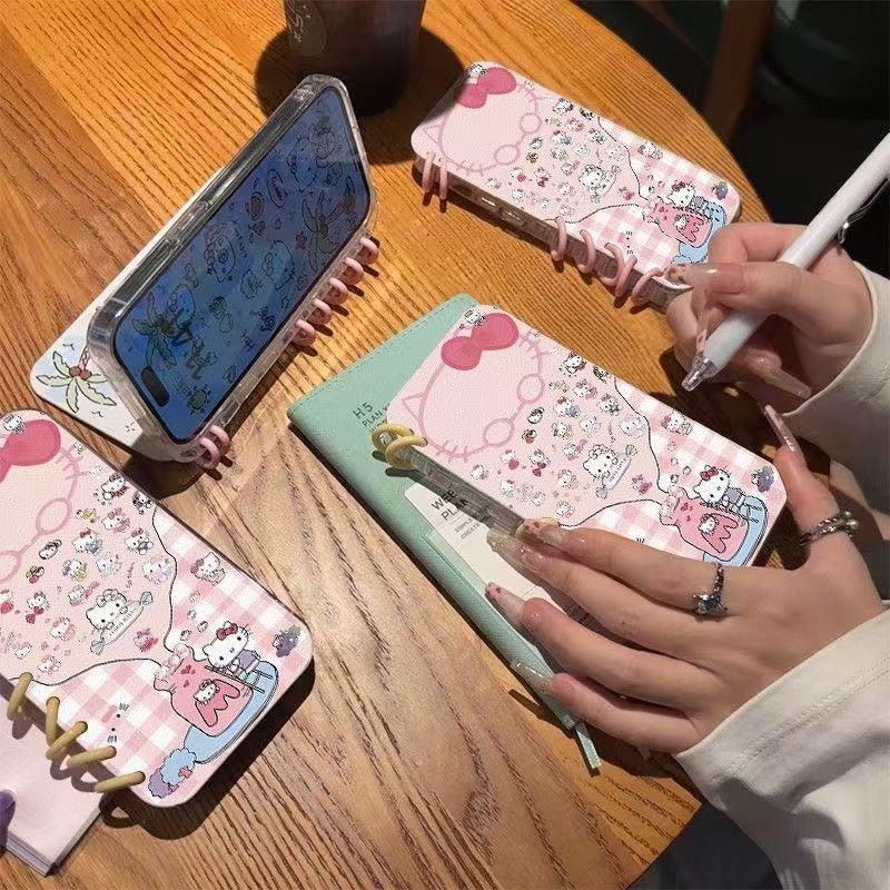 本型スマホケース  人気キャラクター「ハローキティ」が満載テーマ  手帳型スマホケース  キャラクターの柔らかい 折りたたみ式 ノート型 スマホケース  iPhone に対応