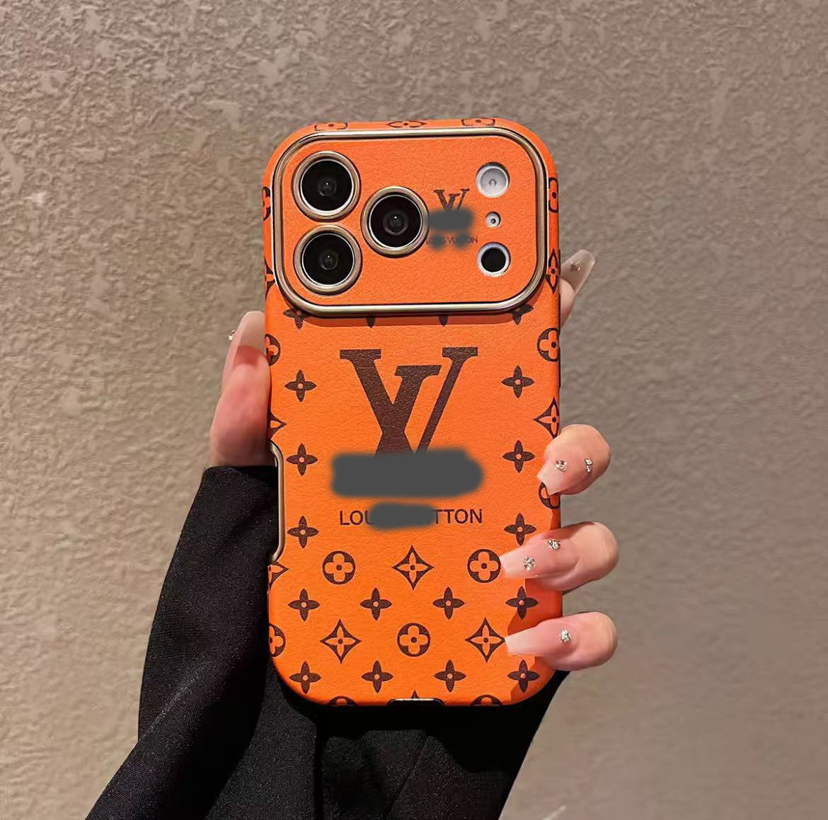 スマホケース  高級感オレンジ色の皮革製スマホケース   ダブルV    耐衝撃・防振性能に優れ、高級感あふれるスマホケースで、iPhone13~17 に対応