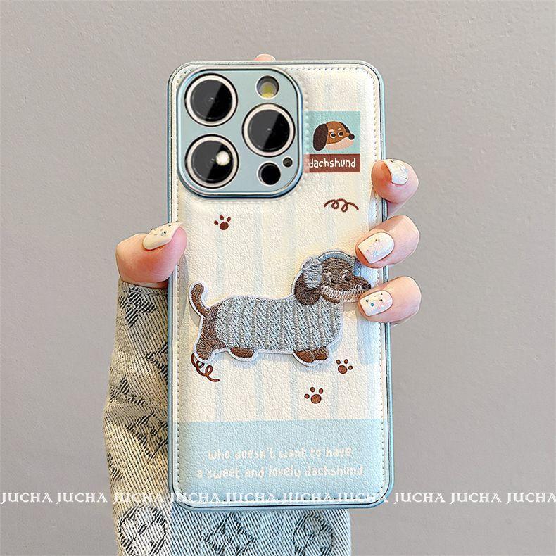 かわいい子犬と英語のデザイン 高級感 あふれる 紐付き スマホケース iPhone に対応