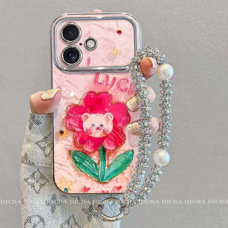 油絵の花とクマ デザイン 高級感あふれるブレスレット兼スタンド付き スマホケース、iPhone に対応
