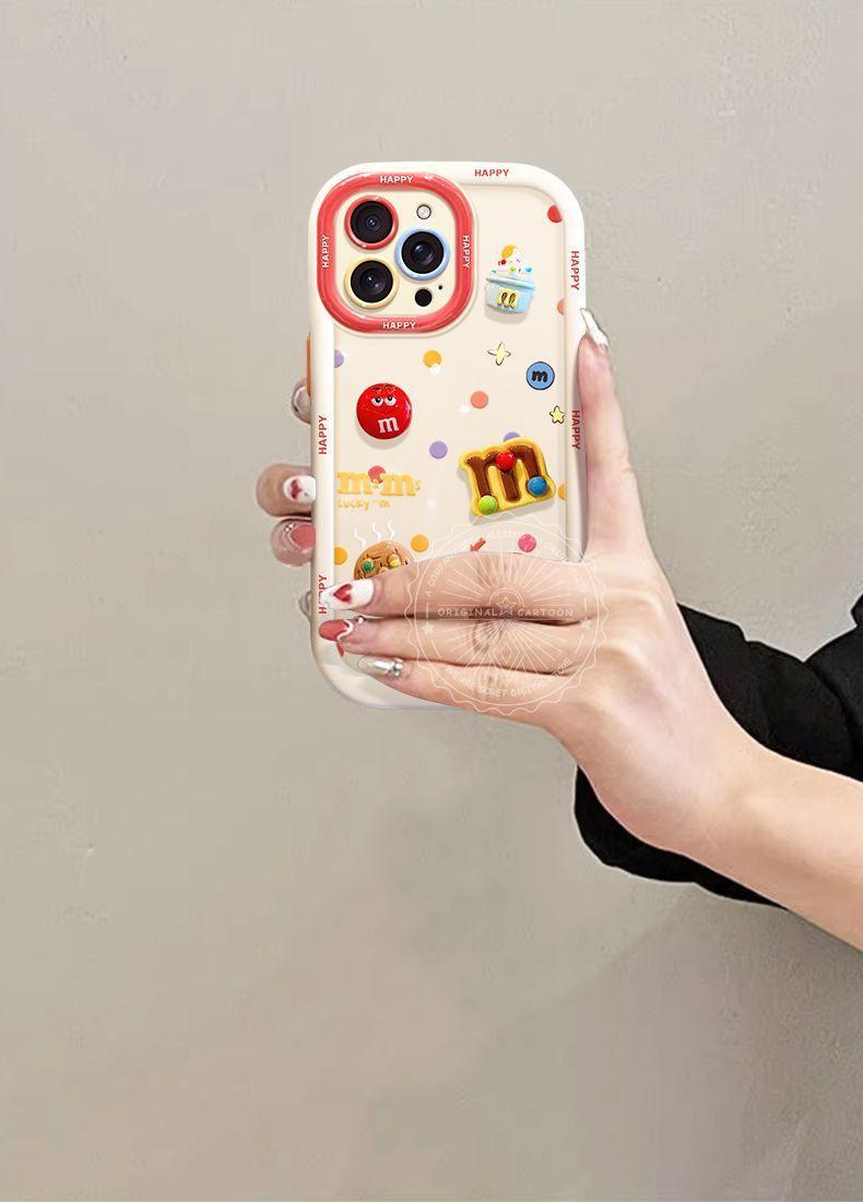 カラフルな立体的な M&M's のデザイン 高級感 あふれる 長短二種類の紐付き スマホケース iPhone に対応