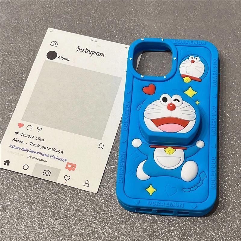 スマホケース 立体で可愛いドラえもんの伸縮スタンド付き、 耐衝撃・防振性能に優れ、高級感あふれるスマホケースで、iPhone に対応