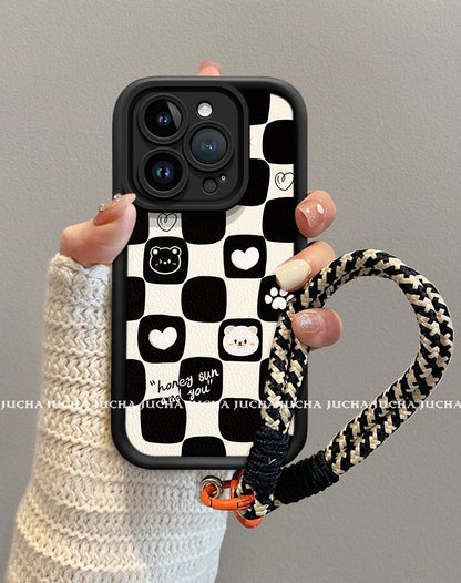 A black and white heart-shaped bear design, excellent shock and vibration resistance, and a luxurious smartphone case with a string that is compatible with iPhones