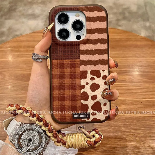 A luxurious smartphone case with a patchwork check pattern design, excellent shock and vibration resistance, and compatible with iPhones.