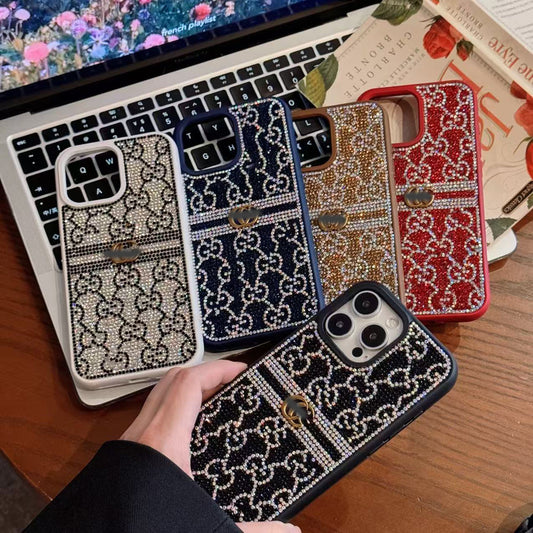 スマホケース  高級感  ダブルG  輝くダイヤモンド  耐衝撃・防振性能に優れ、高級感あふれるスマホケースで、iPhone に対応