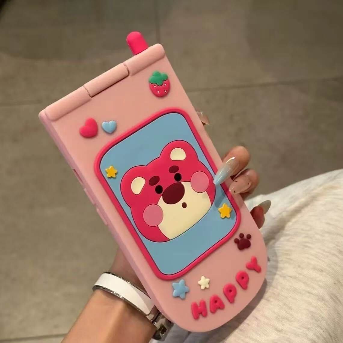 スマホケース  折りたたみ式カートゥーンスマホケース  耐衝撃・防振性能に優れ、高級感あふれるスマホケースで、iPhone に対応