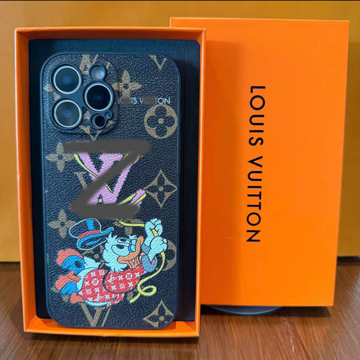 スマホケース  高級感 カートゥーングラフィティ ダブルV 耐衝撃・防振性能に優れ、高級感あふれるスマホケースで、iPhone14~17 に対応