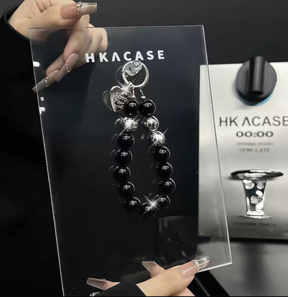 スマホケース  高級感ブレスレットを付き  ダブルDi** 耐衝撃・防振性能に優れ、高級感あふれるスマホケースで、iPhone11~17 に対応