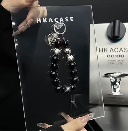 スマホケース  高級感ブレスレットを付き  ダブルDi** 耐衝撃・防振性能に優れ、高級感あふれるスマホケースで、iPhone11~17 に対応