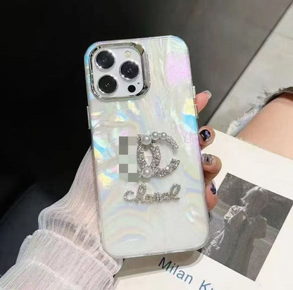 スマホケース  高級感貝殻グリッター  ダブルC  耐衝撃・防振性能に優れ、高級感あふれるスマホケースで、iPhone12~17 に対応