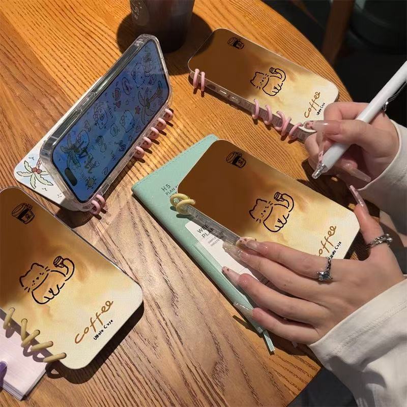本型スマホケース コーヒーカップと愛らしい猫が組み合わテーマ 手帳型スマホケース  キャラクターの柔らかい 折りたたみ式 ノート型 スマホケース  iPhone に対応