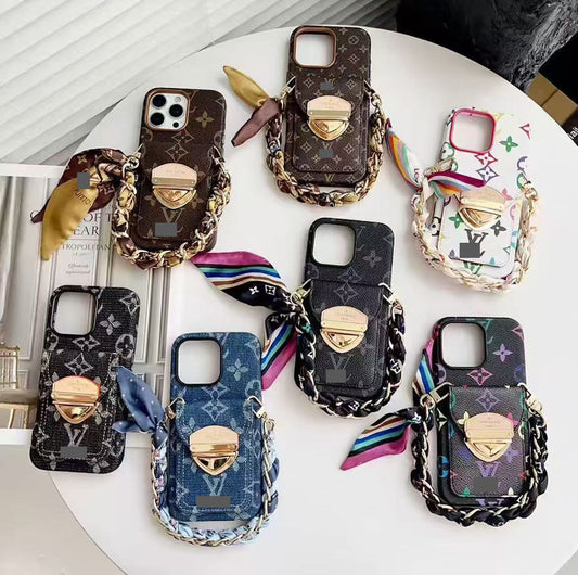 #512  スマホケース  リボンブレスレット付き カード収納付き  耐衝撃・防振性能に優れ、iPhoneに対応