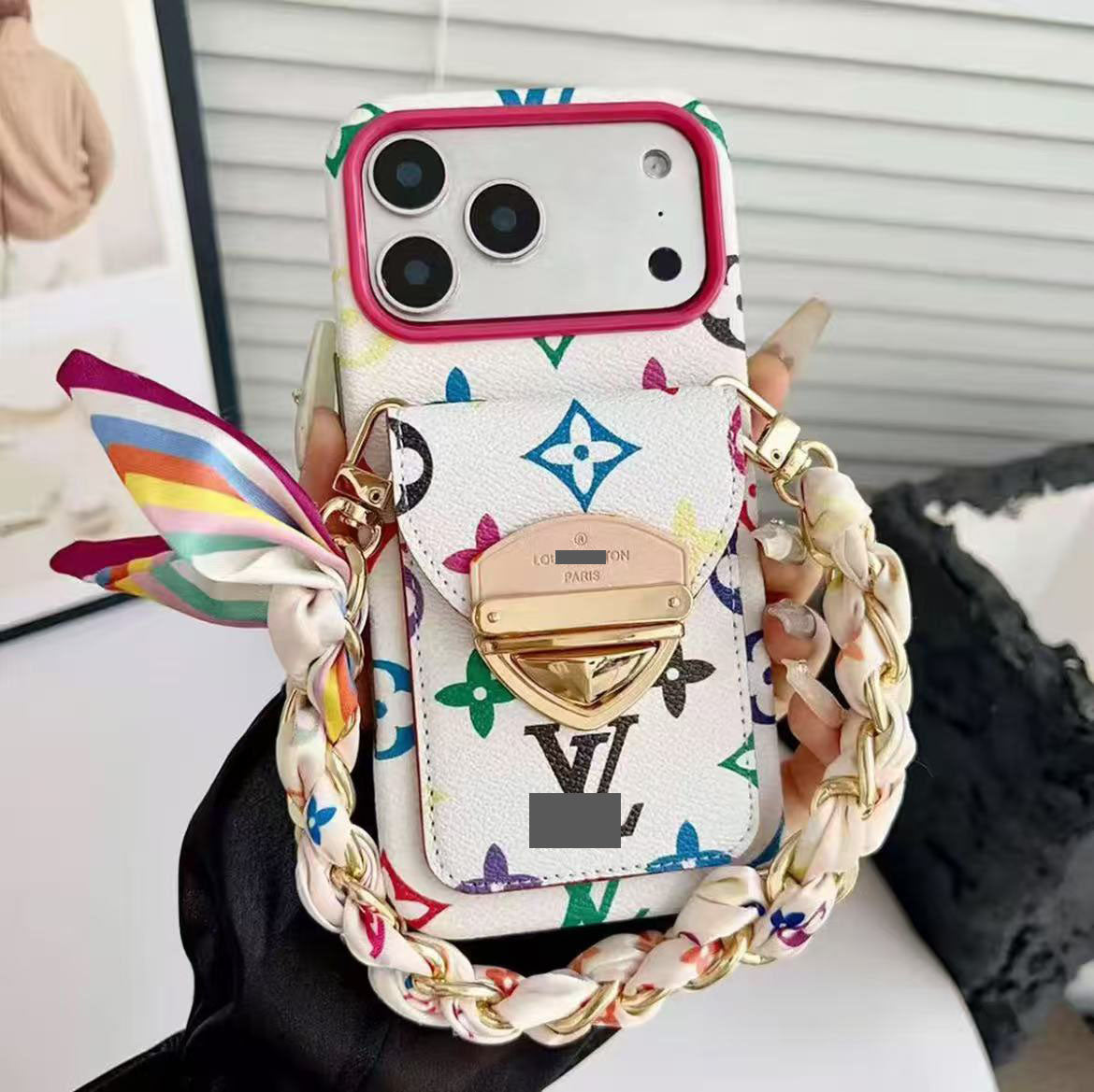 #512  スマホケース  リボンブレスレット付き カード収納付き  耐衝撃・防振性能に優れ、iPhoneに対応