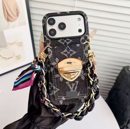 #512  スマホケース  リボンブレスレット付き カード収納付き  耐衝撃・防振性能に優れ、iPhoneに対応