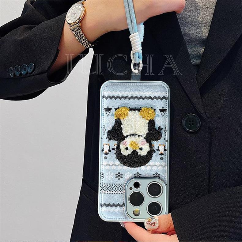 A sweater design with a penguin on it, excellent vibration-proofing, and a luxurious smartphone case with a drawstring that is compatible with the iPhone