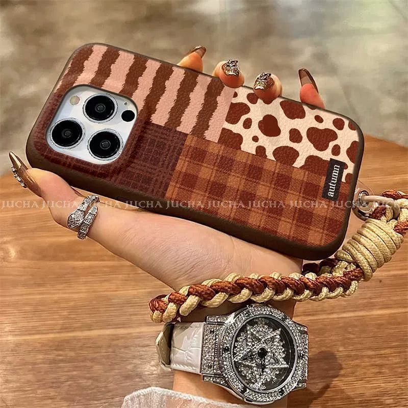 A luxurious smartphone case with a patchwork check pattern design, excellent shock and vibration resistance, and compatible with iPhones.