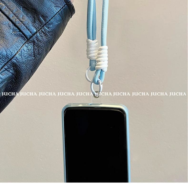 A luxurious smartphone case with a string that has a design of a yeti wearing a scarf, excellent shock and vibration resistance, and is compatible with iPhones.