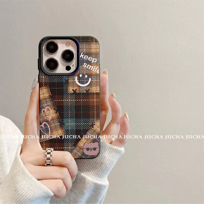 A luxurious smartphone case with a checkered, happy smiling face design, excellent shock and vibration resistance, and compatible with iPhones.