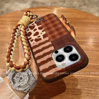 A luxurious smartphone case with a patchwork check pattern design, excellent shock and vibration resistance, and compatible with iPhones.