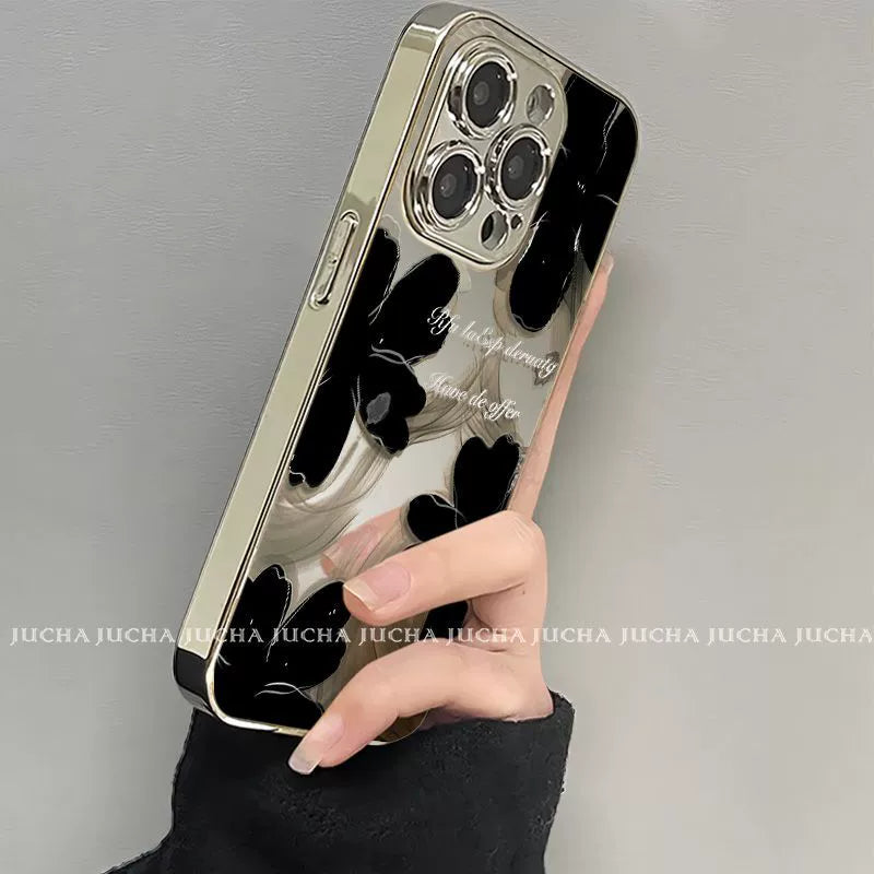 A luxurious smartphone case with a black ink-wash floral pattern for iPhone