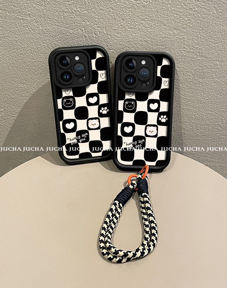 A black and white heart-shaped bear design, excellent shock and vibration resistance, and a luxurious smartphone case with a string that is compatible with iPhones