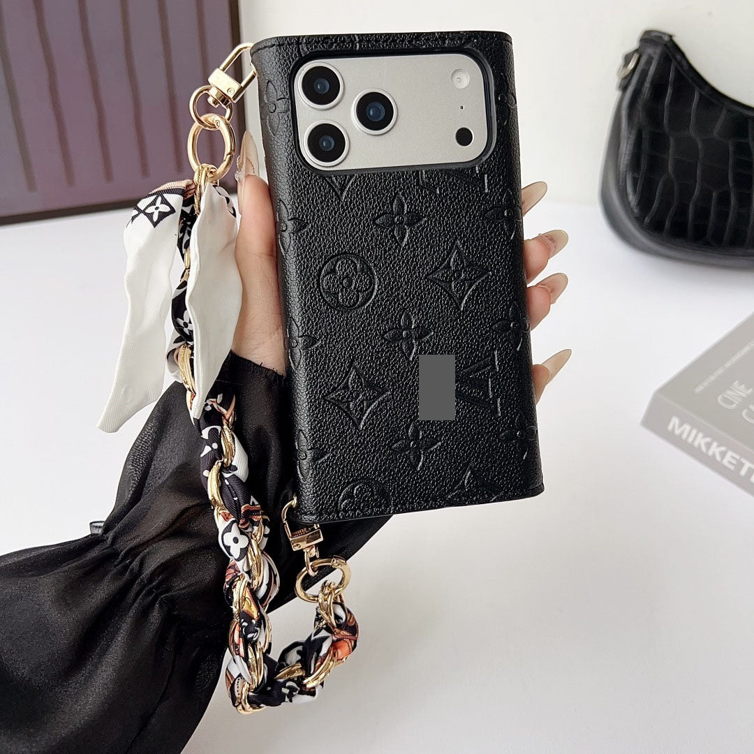 #502  スマホケース   エンボス加工 手紐付きカード入れ付き  耐衝撃・防振性能に優れ、iPhone に対応