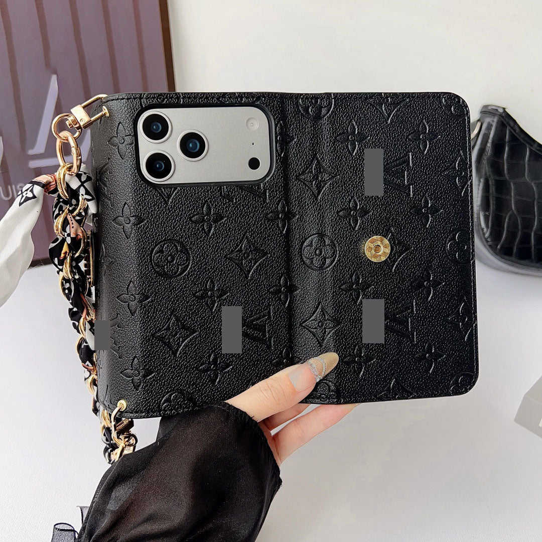 #502  スマホケース   エンボス加工 手紐付きカード入れ付き  耐衝撃・防振性能に優れ、iPhone に対応