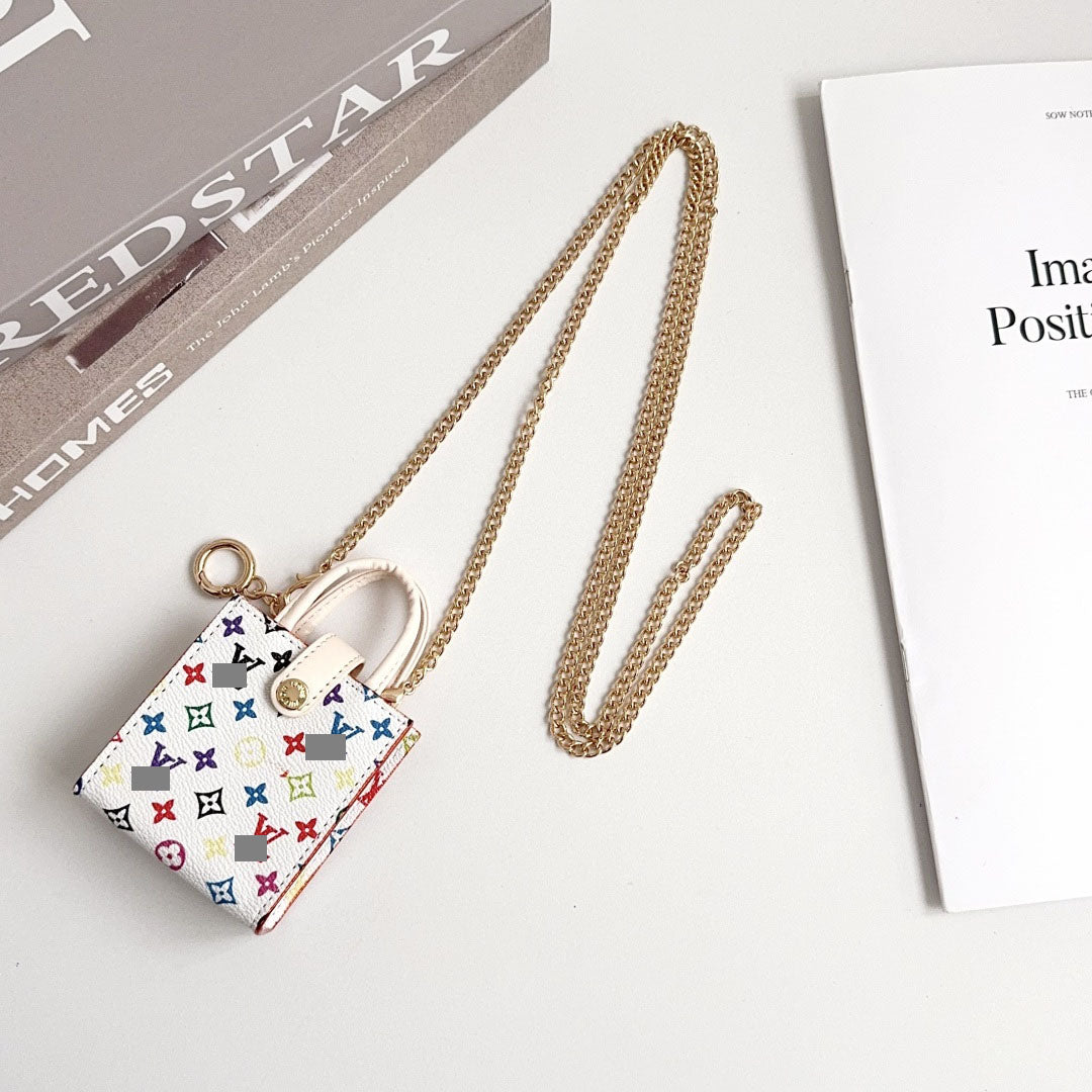 #A06  イヤホンケース  保護カバー  飾りチャーム  汎用タイプ Earphone case