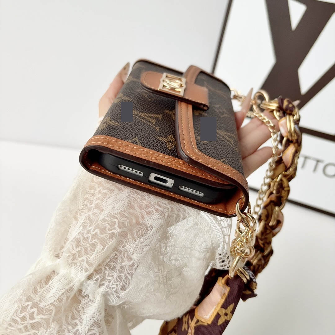 #525  スマホケース  リボンブレスレット付き カード収納付き  耐衝撃・防振性能に優れ、iPhoneに対応