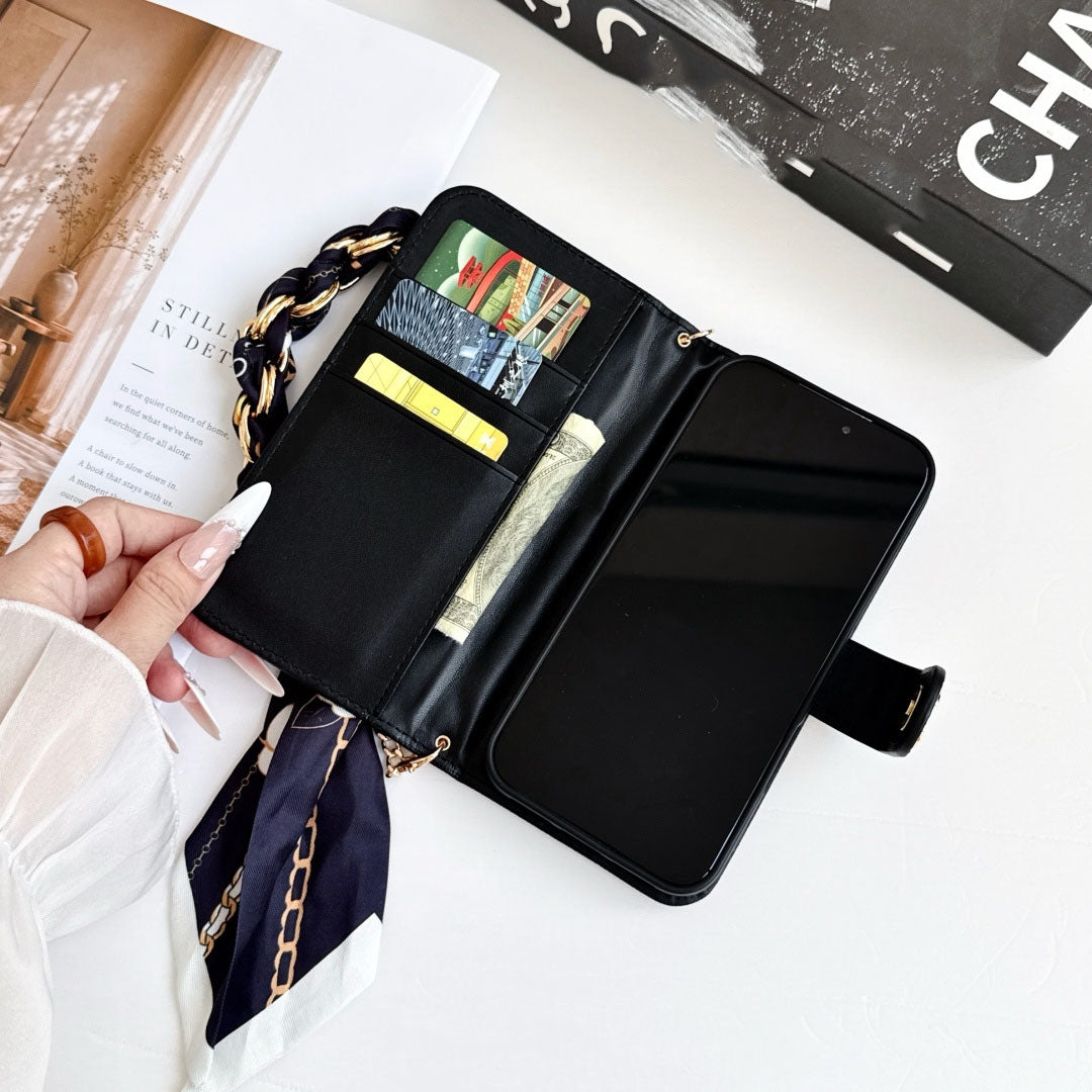 #540  スマホケース  リボンブレスレット付き カード収納付き  耐衝撃・防振性能に優れ、iPhoneに対応