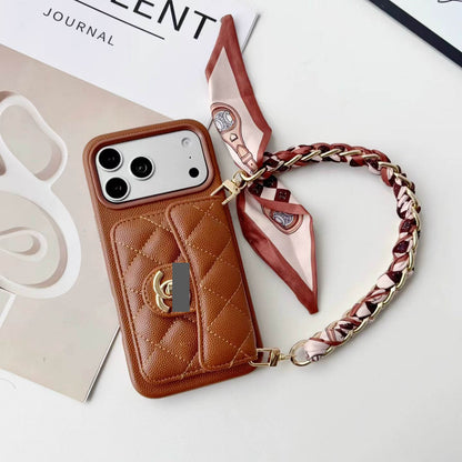 #536  スマホケース  リボンブレスレット付き カード収納付き  耐衝撃・防振性能に優れ、iPhoneに対応